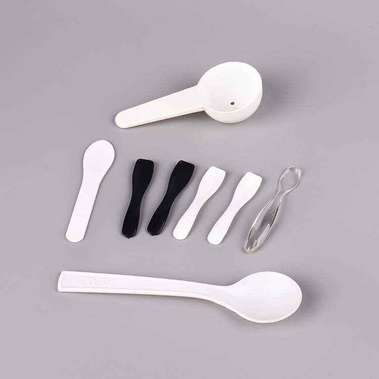 Cosmetics packaging / Spatula